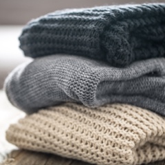 A stack of folded blankets